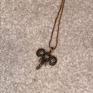 Long gold elephant necklace